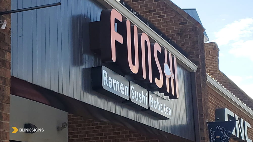 Custom 3D illuminated channel letter building sign for Funshi restaurant displaying ramen, sushi, and boba.