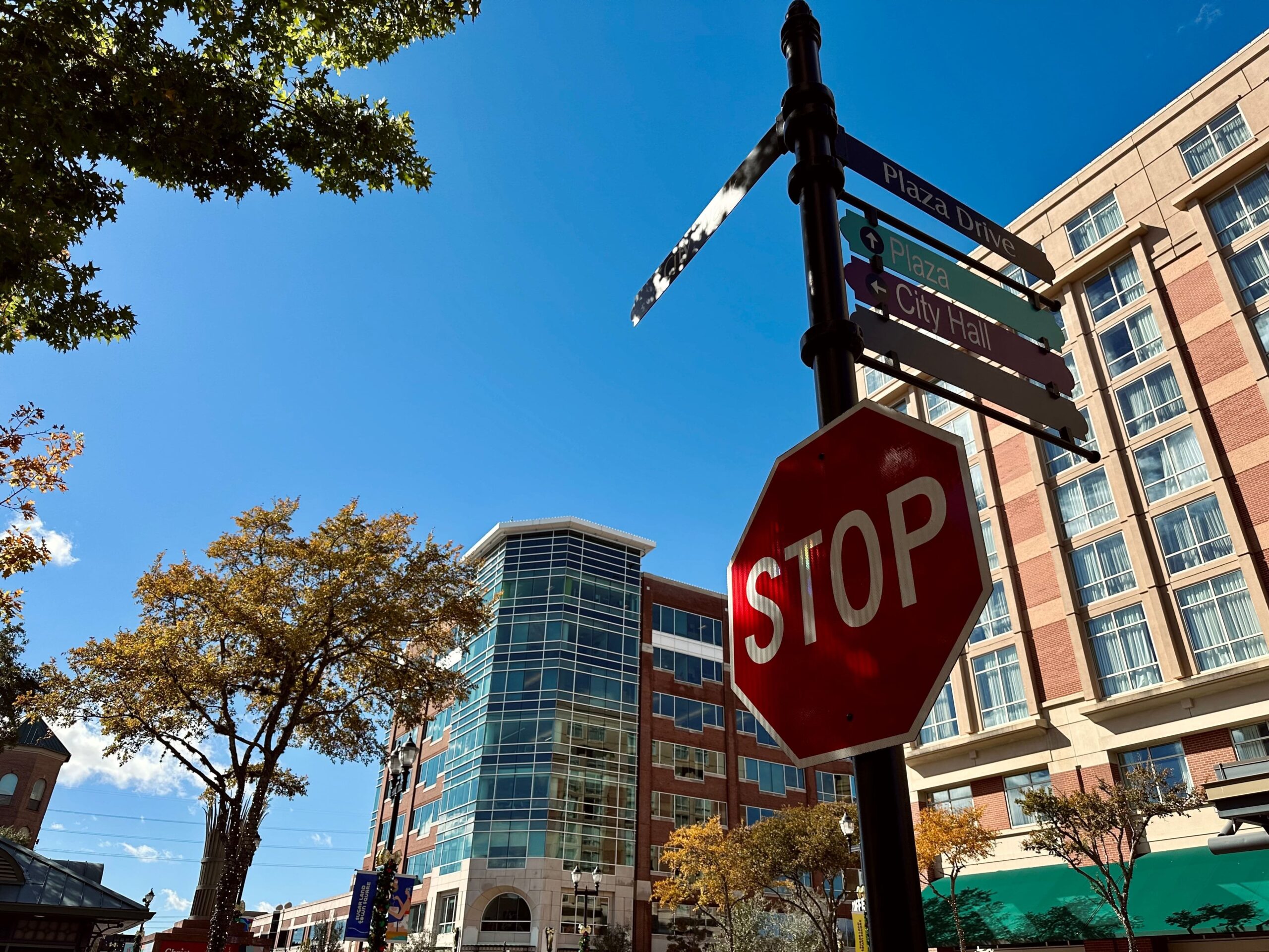 red stop signs on the pole