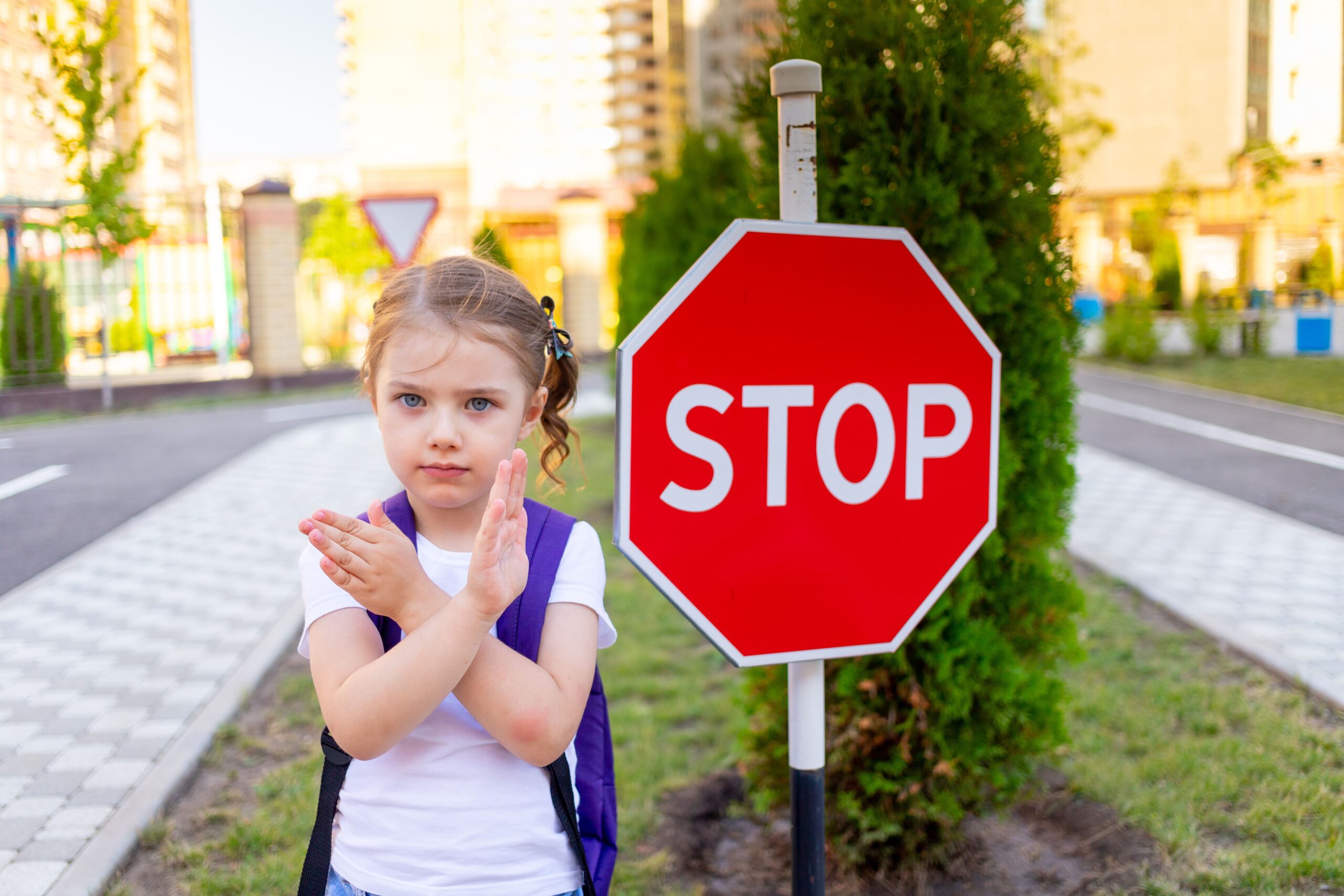 schoolgirl-girl-with-stop-sign-crosses-road-learns-rules-road