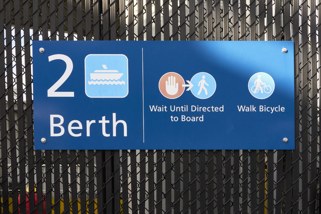 blue-sign-for-berth-2-providing-passenger-informat