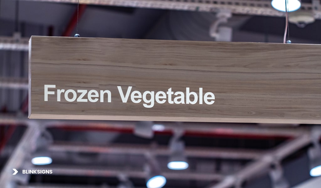 Department Signs in a Super Market of Frozen Vegetables