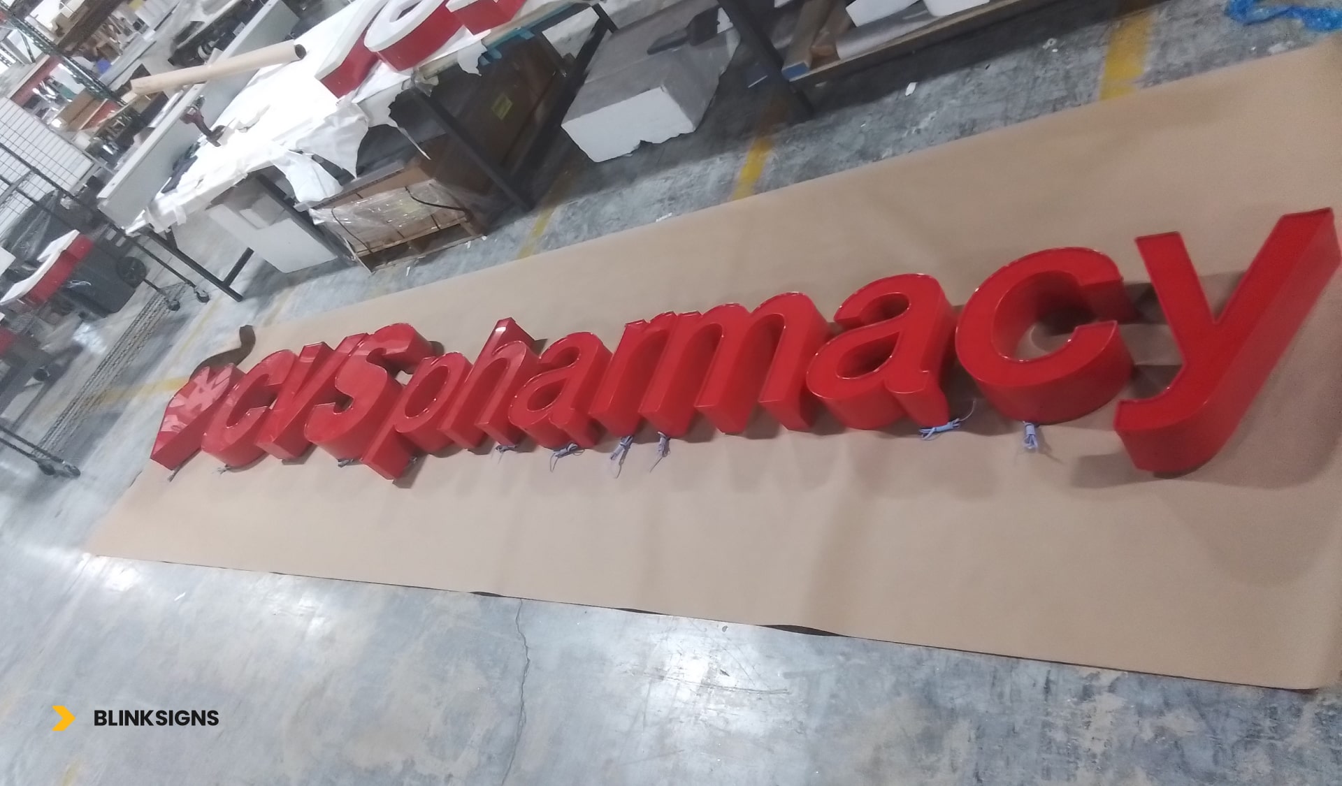 Custom Engineering for CVS pharmacy signage in a production factory