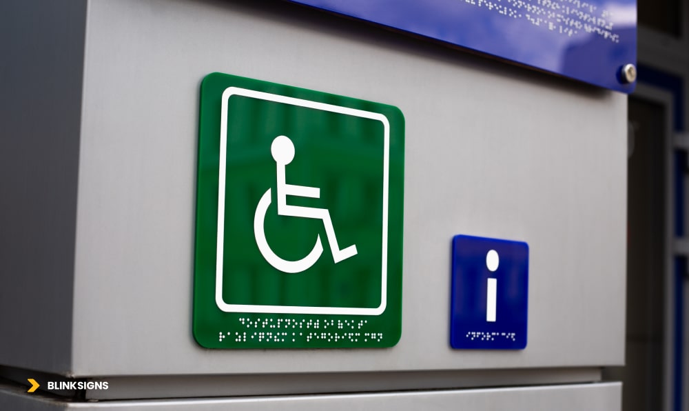 Wayfinding Accessibility: Designing Inclusive Navigation Systems for All Users 4 Green logo of a person on a wheelchair with braille text a sign with information for blind people