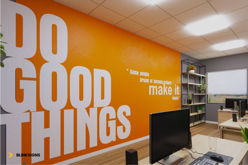 Workplace Environmental Graphics: Boosting Culture, Productivity & Brand Identity 4 orange and white wall graphics that says a quote "Do good things, some people dream of success othe rmake it"