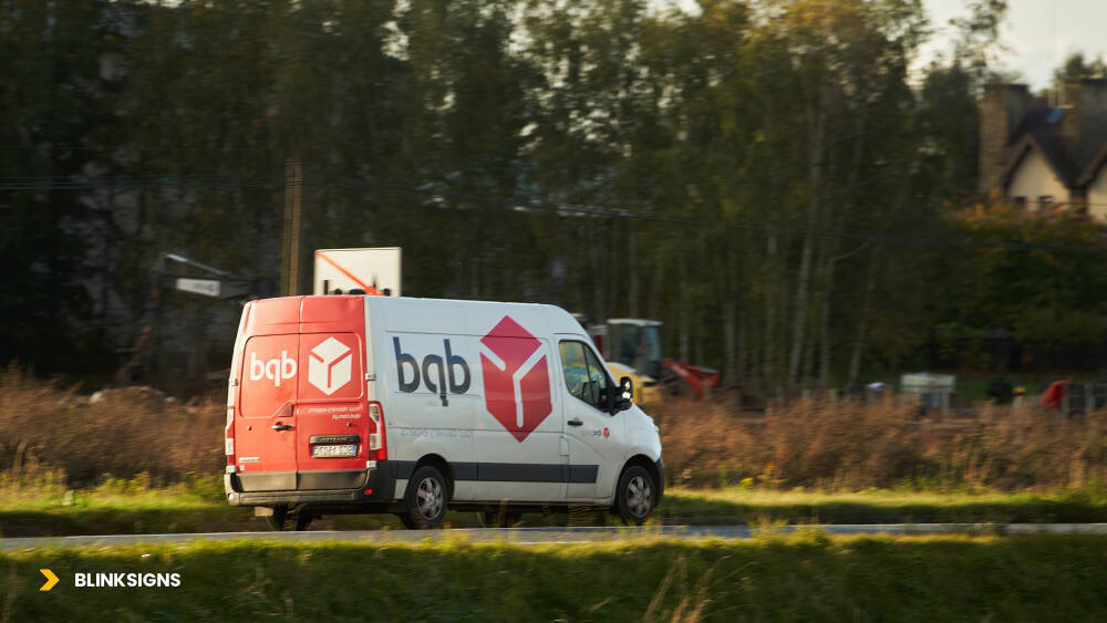 A branded van of bqb in a rural area